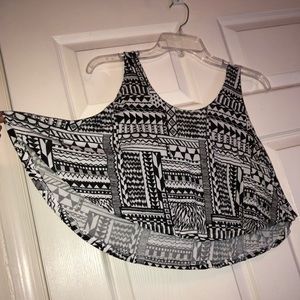 High Front Low Back Crop Top. Worn.